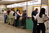 Attendees at the 
registration booths.