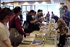Attendees browse 
the available books.