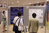 Attendees view posters at the 
reception.